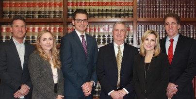 Pictured L-R: Attorneys Ben Bruner, Melissa Schilling, John Lande, Ron Mountsier, Amy Plummer, and Brad Kruse.